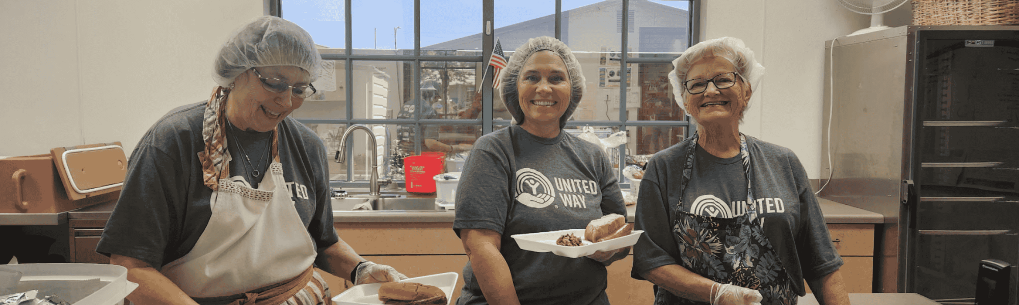 Volunteers serving lunch